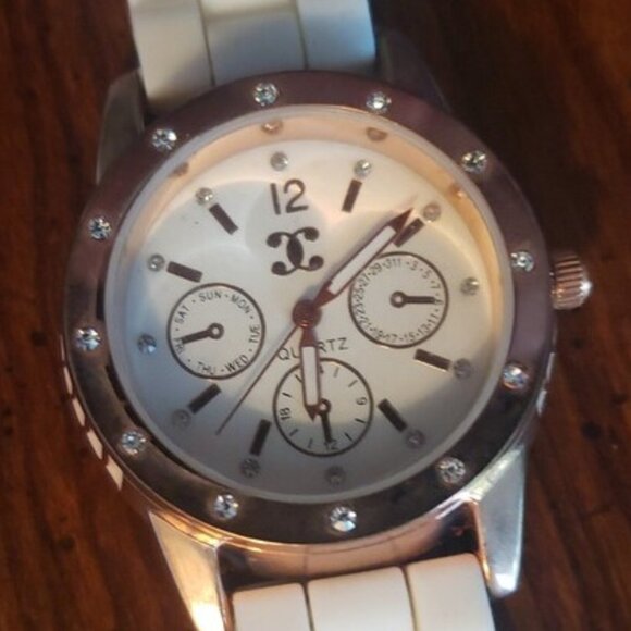 Charming Charlie Rose Gold Watch W/ Rhinestones, Quartz Movement, and White Band - Picture 4 of 14